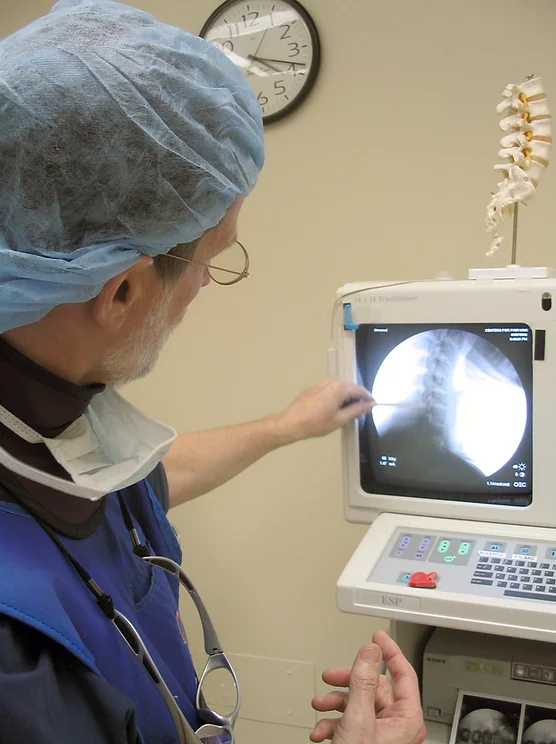 Doctor Looking At An X-ray