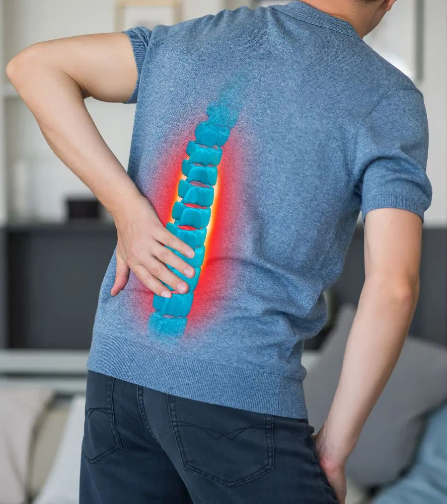 Man Holding Lower Back in Pain