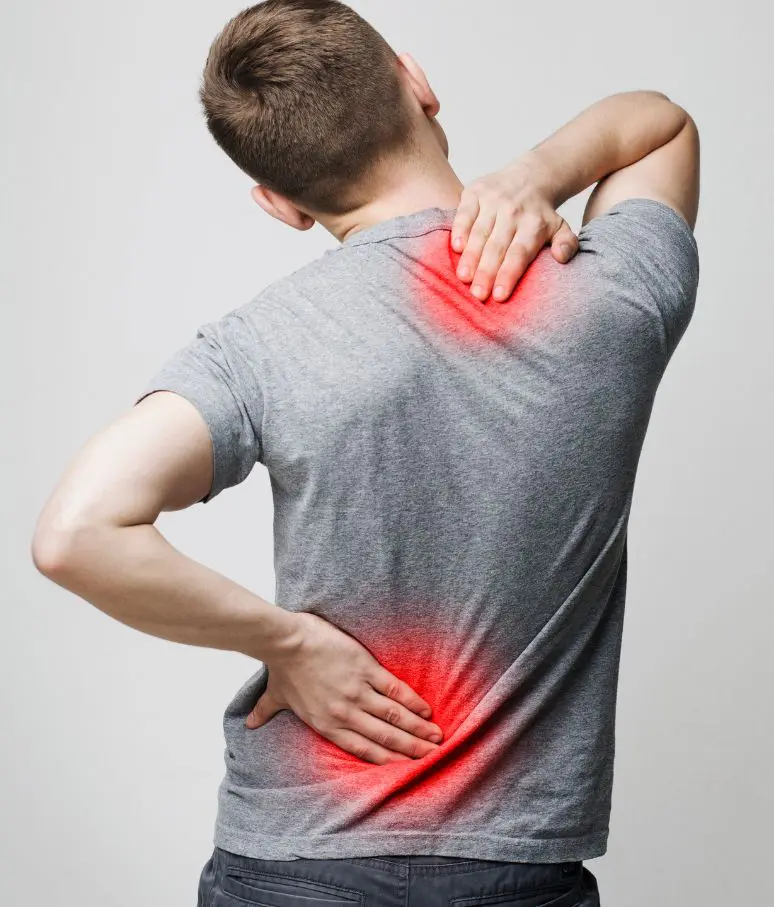 Man Experiencing Neck And Back Pain In Indiana